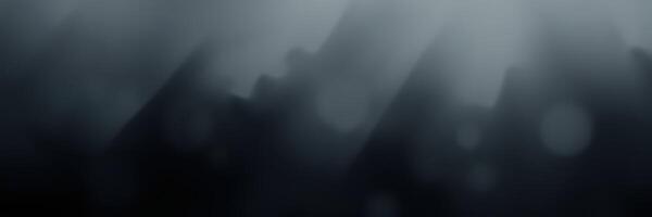 Mysterious fog envelops mountain landscape during early morning hours creating an eerie atmosphere photo