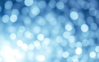 Soft blue bokeh lights create a dreamy atmosphere in a blurred background setting photo