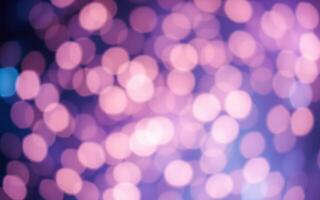 Colorful bokeh lights create a dreamy atmosphere during a nighttime celebration with vibrant hues photo