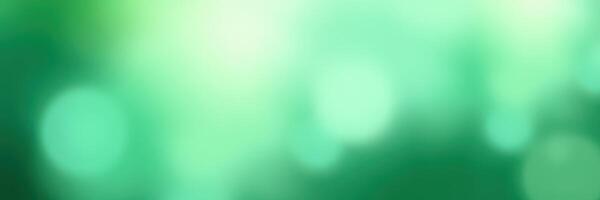 Soft green bokeh background with circular light patterns creating an abstract dreamy effect in natural settings photo