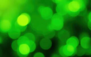 Vivid green bokeh background creates a lively and dynamic atmosphere for various designs and projects photo
