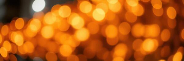 Bright orange bokeh lights create a warm atmosphere during an evening celebration in a festive location photo