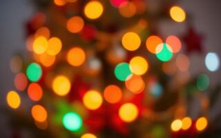 Colorful bokeh lights adorn a festive tree during the holiday season creating a warm atmosphere and cheerful ambiance in a cozy home photo