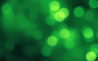 Vibrant green bokeh effect creates an enchanting atmosphere with soft glowing lights in a festive setting photo