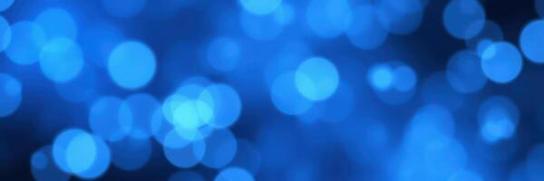 Vibrant blue bokeh background creates an enchanting atmosphere in evening light for artistic displays photo