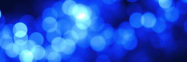 Colorful blue bokeh lights create a dreamy atmosphere for evening gatherings photo