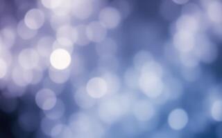 Soft blue bokeh lights create a serene atmosphere during a calm evening in a cozy setting photo