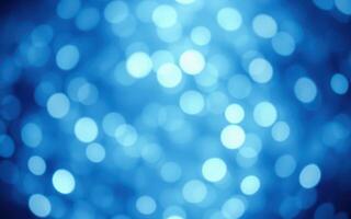 Soft blue bokeh lights create a dreamy atmosphere for celebrations or events photo
