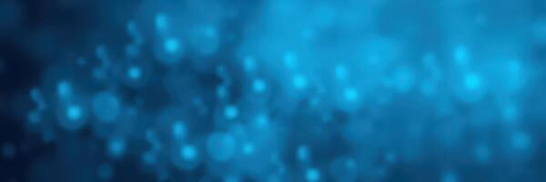 Vibrant blue abstract background with bokeh effect creating a soothing atmosphere in digital art design photo