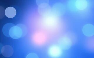 Colorful bokeh background with blurred light spots creating a serene atmosphere at nighttime photo