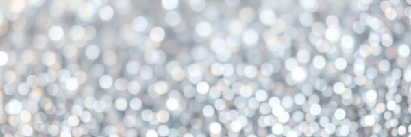 Sparkling silver bokeh background creates a festive atmosphere for celebrations and events during the holiday season photo