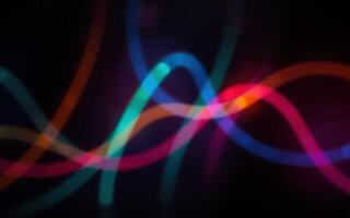 Colorful light patterns dance in abstract composition during night time display photo