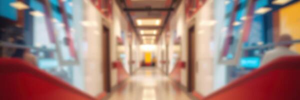 Brightly lit corridor in a modern building showcasing contemporary design elements and vibrant colors photo