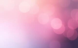 Soft pink bokeh lights creating a dreamy atmosphere suitable for various artistic projects photo
