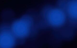 Soft blue glowing lights create a tranquil atmosphere in a dark setting for relaxation or meditation photo