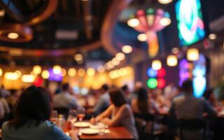 Dining experience in a vibrant restaurant with colorful lights and a lively atmosphere during the evening photo