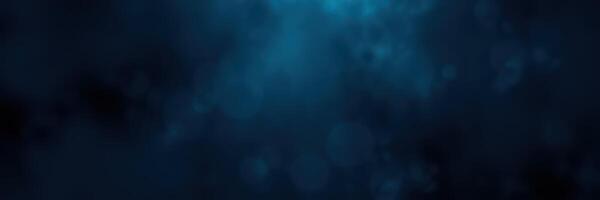 Mysterious blue underwater scene with soft light illuminating the depths of the ocean photo