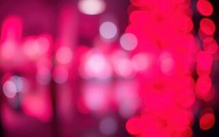 Bright abstract light patterns create a vibrant atmosphere in a lively venue during the night photo