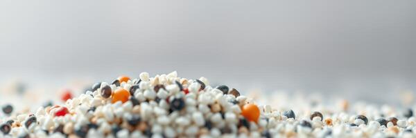 Colorful grains arranged on a white surface highlighting texture and variety in a culinary setting photo