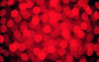 Vivid red hexagonal patterns creating a vibrant and dynamic backdrop for celebrations and events photo