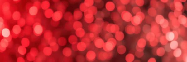 Colorful red bokeh lights create a festive atmosphere for celebrations and gatherings during the evening hours photo
