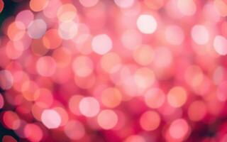 Beautiful bokeh effect creates a soft and vibrant background of pink and orange hues for artistic visuals photo