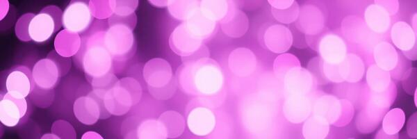Vibrant purple bokeh lights create an enchanting atmosphere during an evening celebration photo