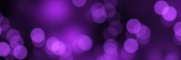 Vibrant purple bokeh lights create a dreamy atmosphere at an evening event photo