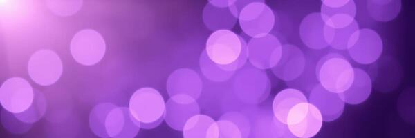 Colorful bokeh lights create a dreamy atmosphere in a purple-themed backdrop for a festive gathering photo