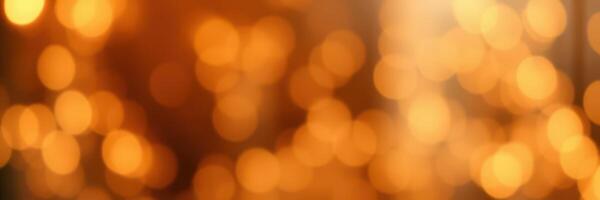 Elegant golden bokeh lights create a warm and inviting atmosphere at a festive gathering during the evening photo