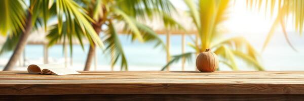 Relaxing tropical setting with a coconut and a book near the beach at sunset photo