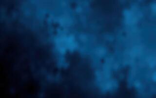 Vibrant blue abstract background with misty texture creating a sense of depth and calmness for artistic purposes photo
