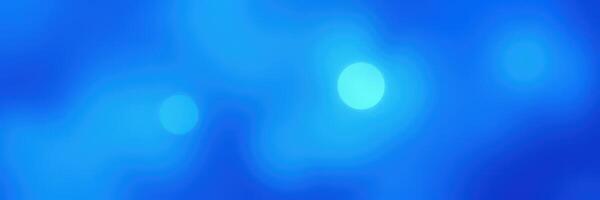 Vibrant blue abstract background with glowing circular lights creating a serene atmosphere at dusk photo