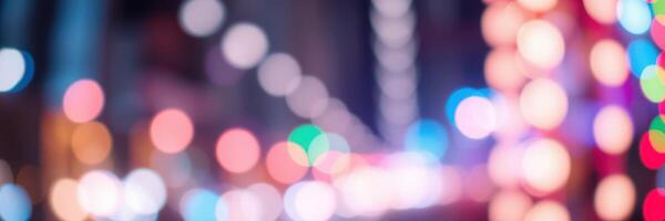 City lights illuminate the street during a vibrant evening in an urban setting filled with colorful bokeh effects photo
