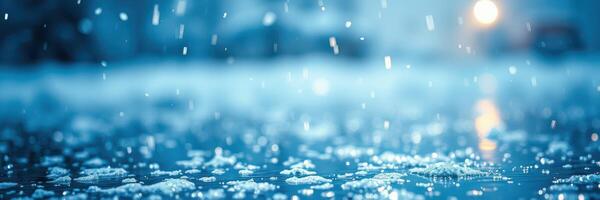 Raindrops fall onto a serene surface creating ripples in a blue-tinted environment during a calm evening photo