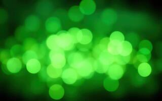 Green bokeh lights create a dreamy atmosphere during evening celebrations in a festive setting photo