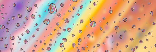Colorful droplets of water reflect light against a bright, abstract background photo