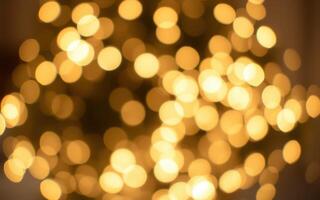 Warm golden lights illuminate a festive setting on a cozy winter evening perfect for gathering and celebration photo