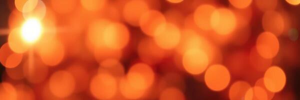 Warm, glowing orange bokeh lights create a cozy atmosphere during an evening celebration photo