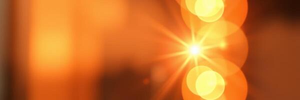 Bright sunlight creates beautiful bokeh effect with warm tones in a cozy indoor setting during late afternoon photo