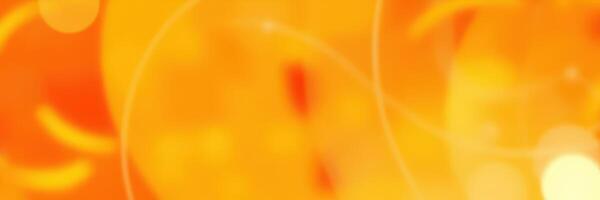 Bright abstract orange background with vibrant circles and glowing lights creating a warm atmosphere photo