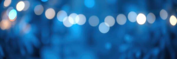 Evening ambiance with blue lights and blurred background creates a serene atmosphere at an outdoor gathering photo