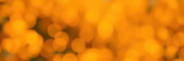 Beautiful golden bokeh background creates a warm and inviting atmosphere for various occasions photo