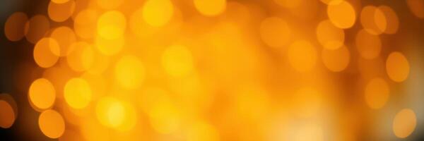Bright golden bokeh lights create a warm and inviting atmosphere during an evening gathering photo