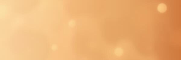 Warm golden abstract background with blurred light effects creating an elegant atmosphere suitable for various design applications photo