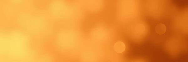 Bright orange abstract background with soft bokeh effects creating a warm and inviting atmosphere for creative designs photo