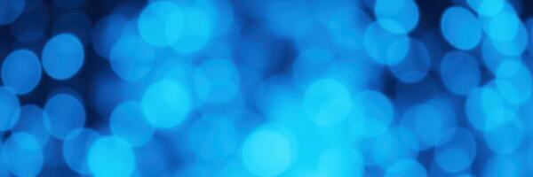 Abstract blue background with glowing lights creating a vibrant atmosphere photo