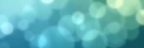 Soft blue bokeh background creating a serene atmosphere with light reflections at twilight photo