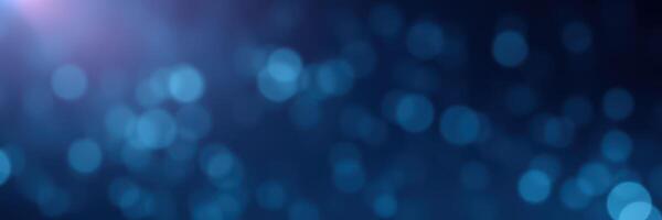 Soft blue bokeh lights create a calming atmosphere in an evening setting photo