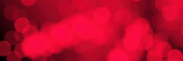 Vibrant red bokeh lights create a warm and inviting atmosphere in an evening setting photo